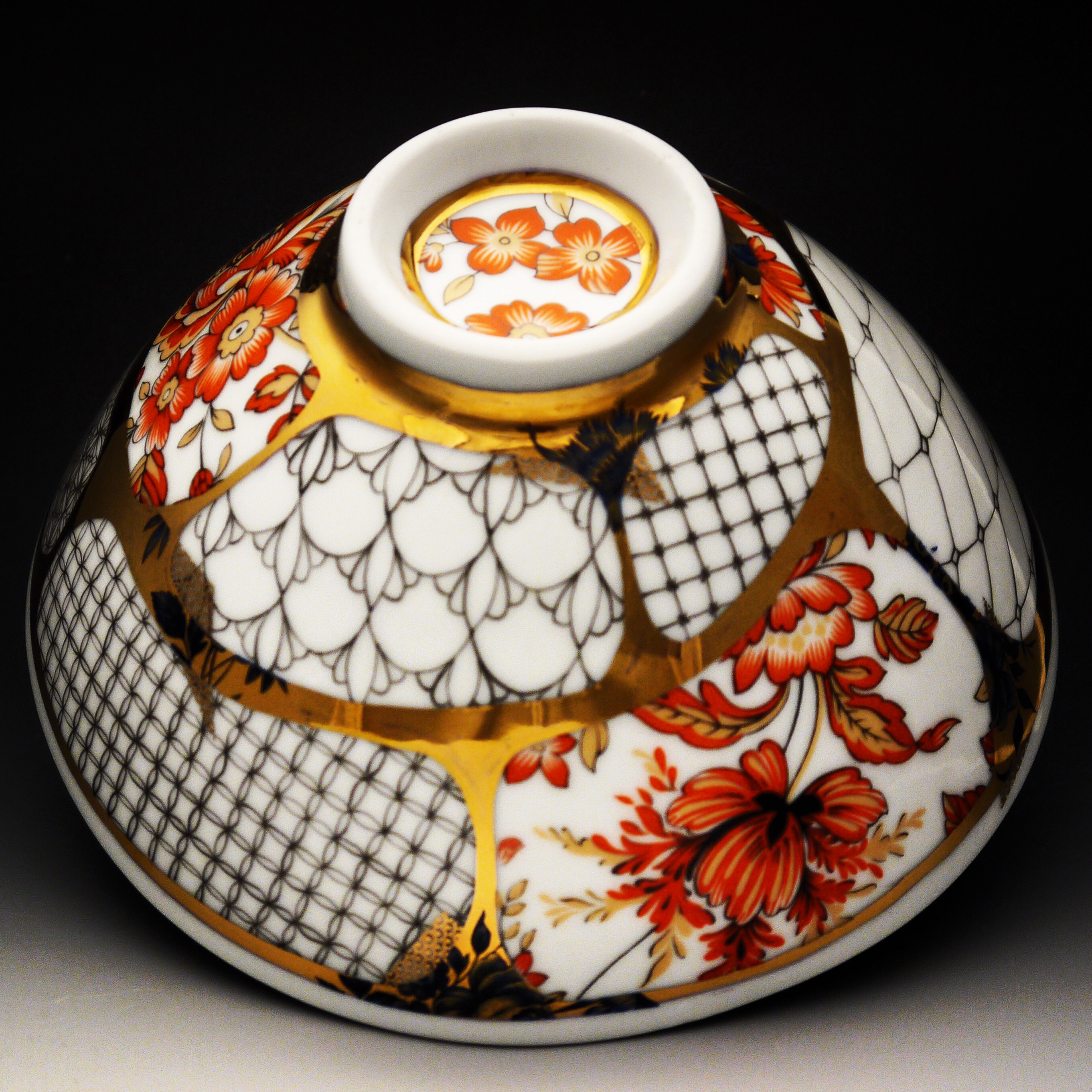 Title: “Japanese Noodle Bowl II” | Size: h4 inches x w9 inches | Materials: Chinese Porcelain, Japanese Vintage Flower Decal, German Gold Luster, China Paint (Contact Reese Gallery for pricing: 314.954.7638)