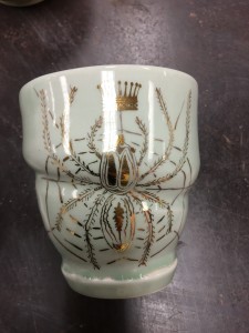 gold luster / decal application in ceramics workshop by melanie sherman - student work sample