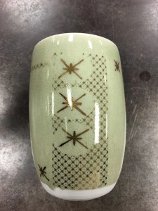 gold luster / decal application in ceramics workshop by melanie sherman - student work sample